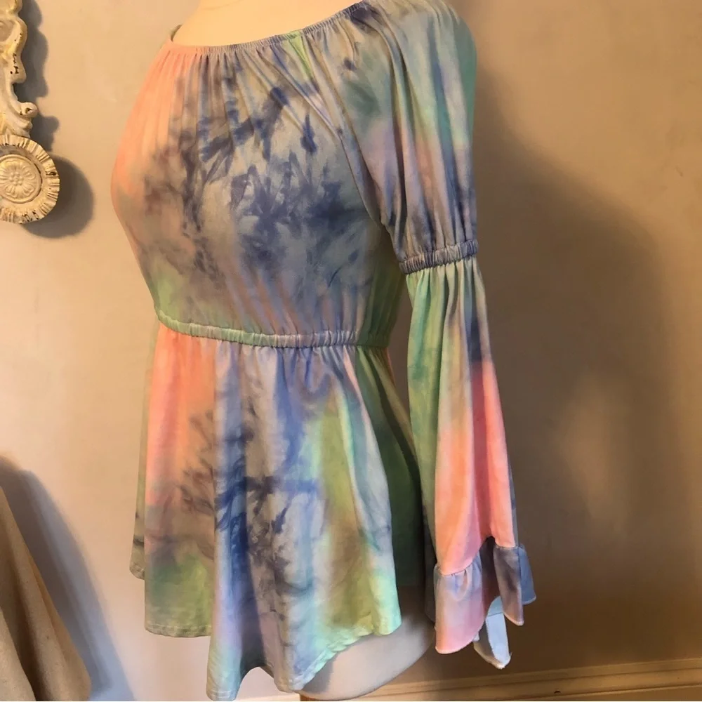 Girls tie dyed pink top w/elastic waist & upper arms w/ long ruffle bell sleeves